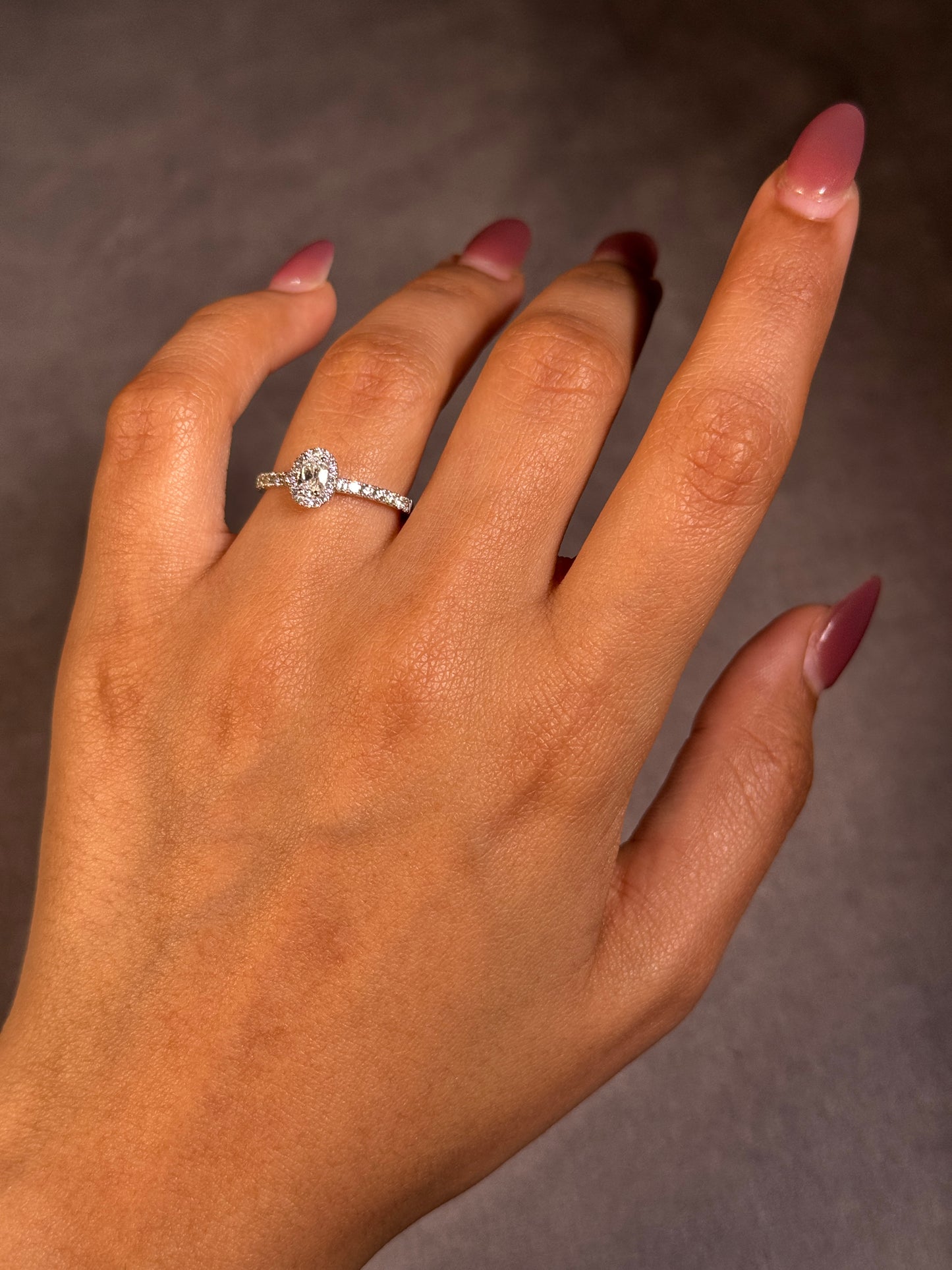 0.66 Carat Oval Cut Diamond, 18K White Gold Ring