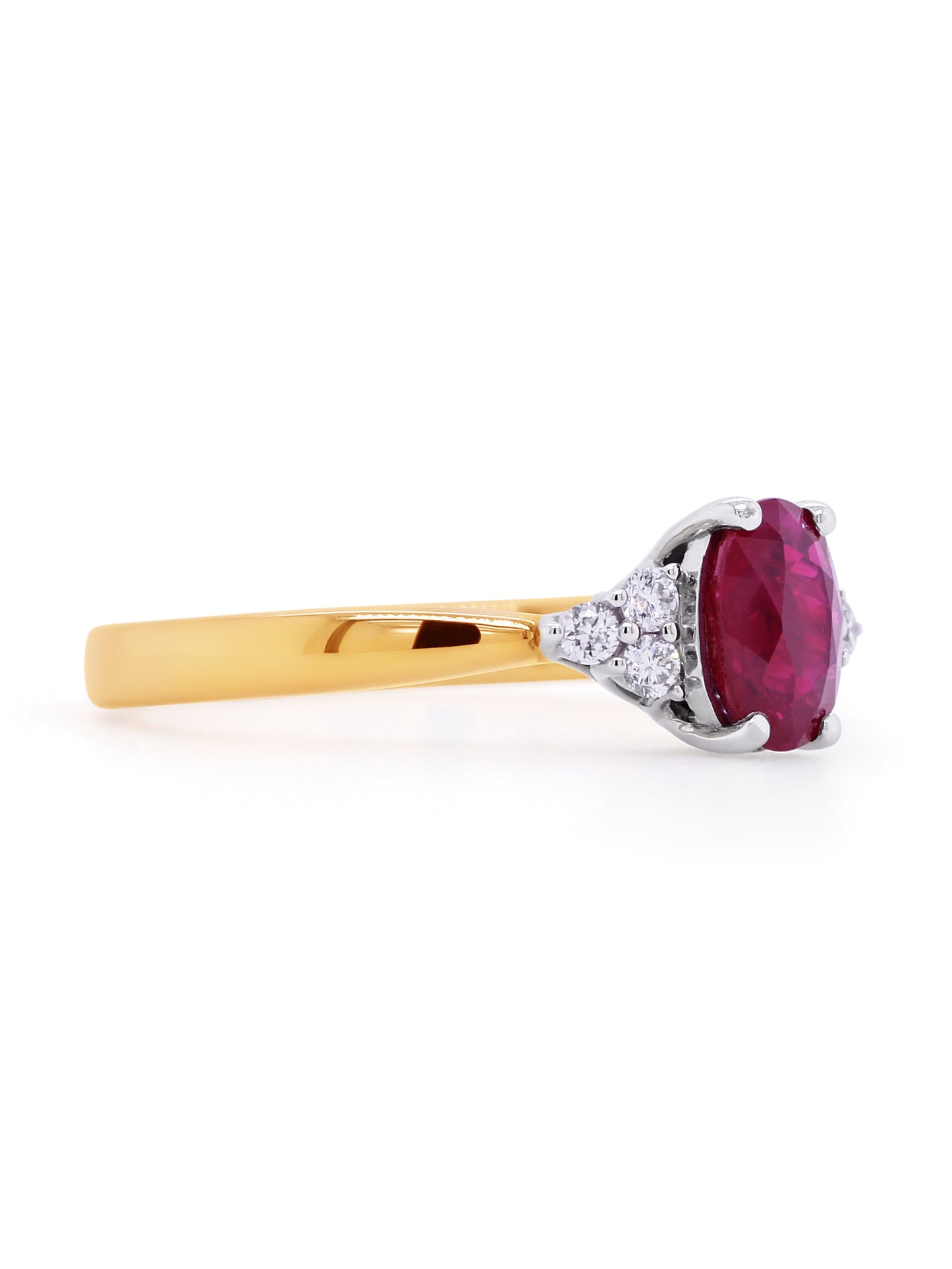 Natural Ruby & Diamonds set in 18K Yellow Gold.