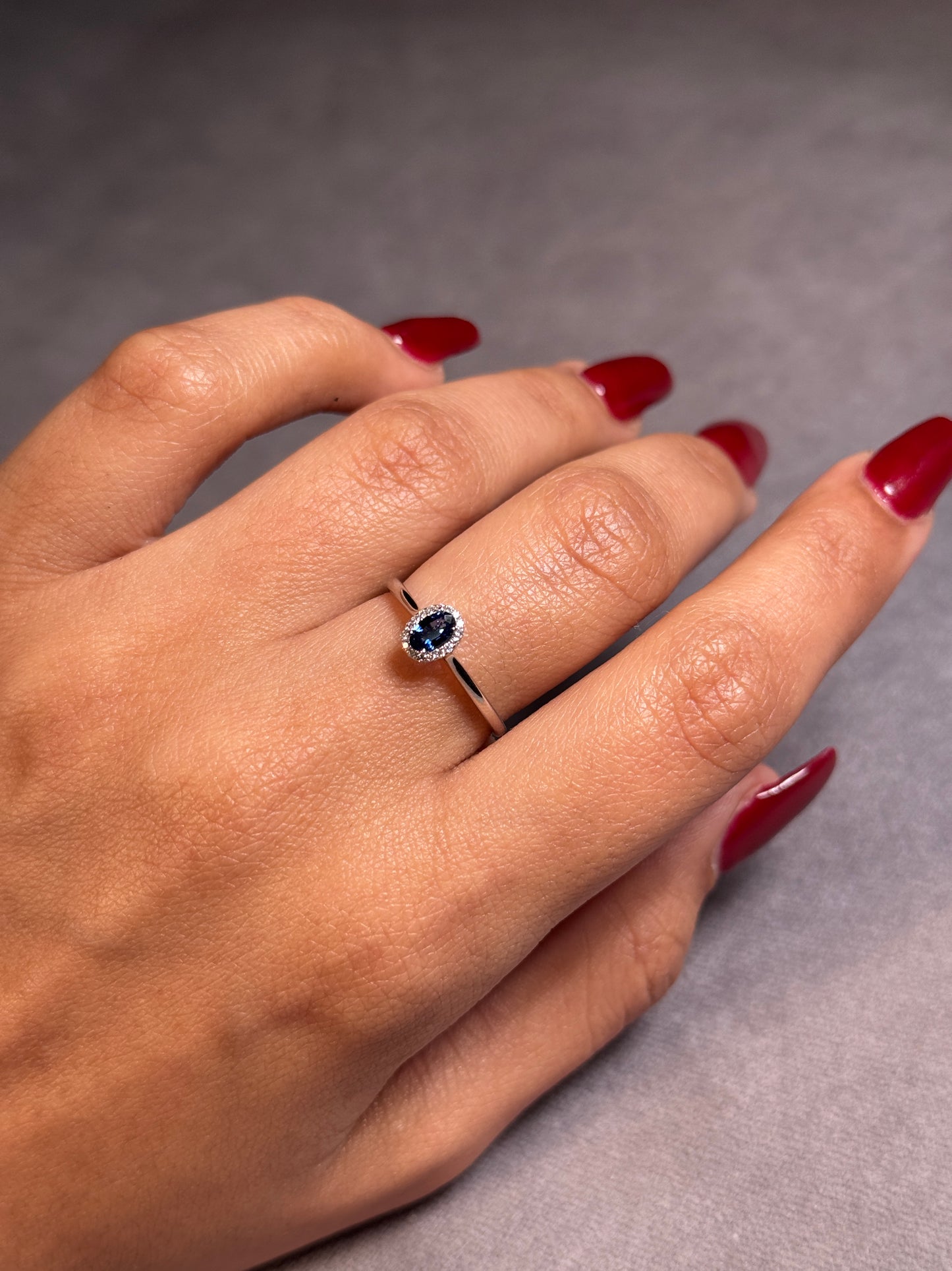 Oval Sapphire & Diamond Halo Ring, 18K White Gold.