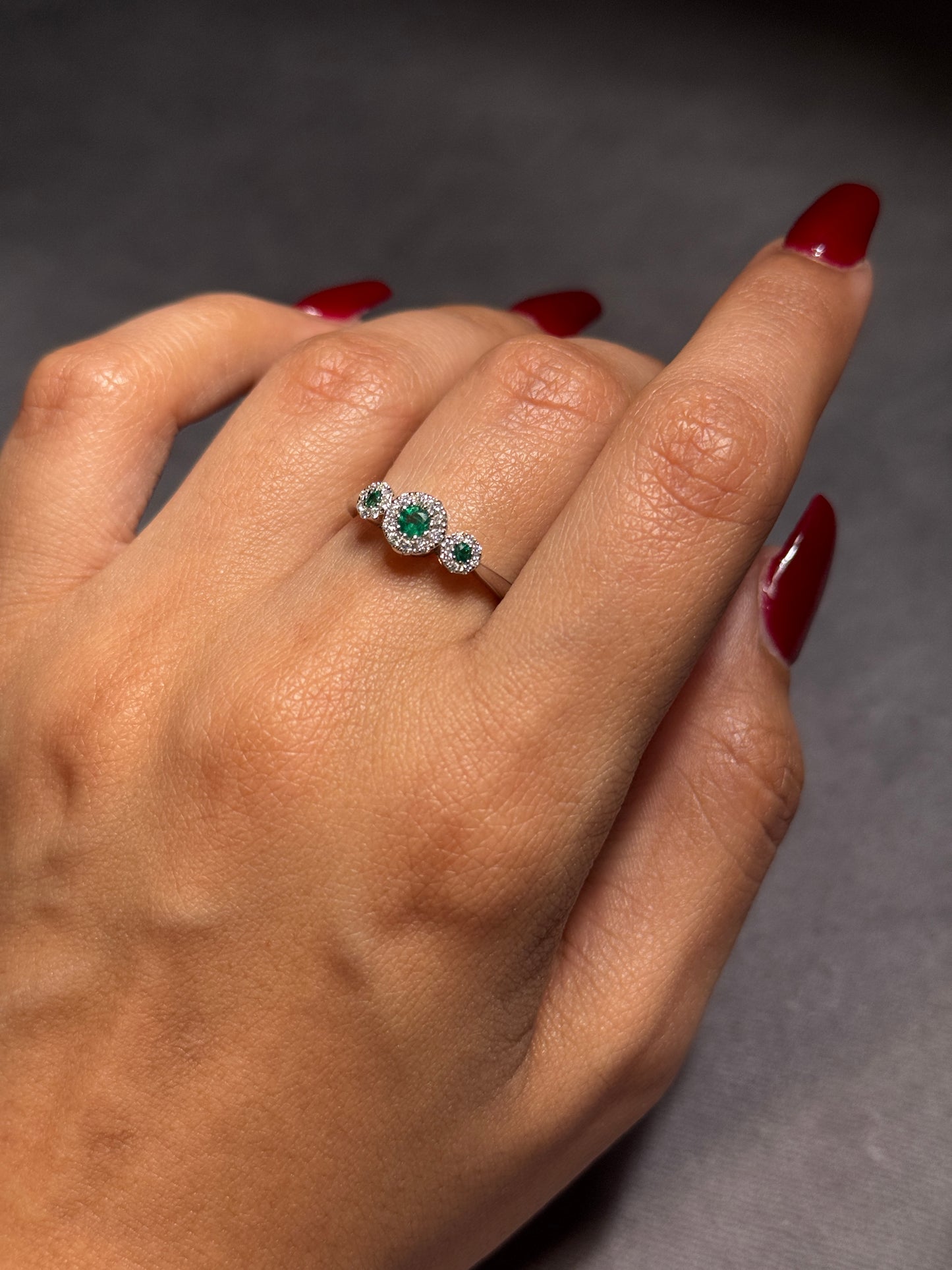 Emerald & Diamond Halo Trilogy Ring, 18 Carat White Gold.