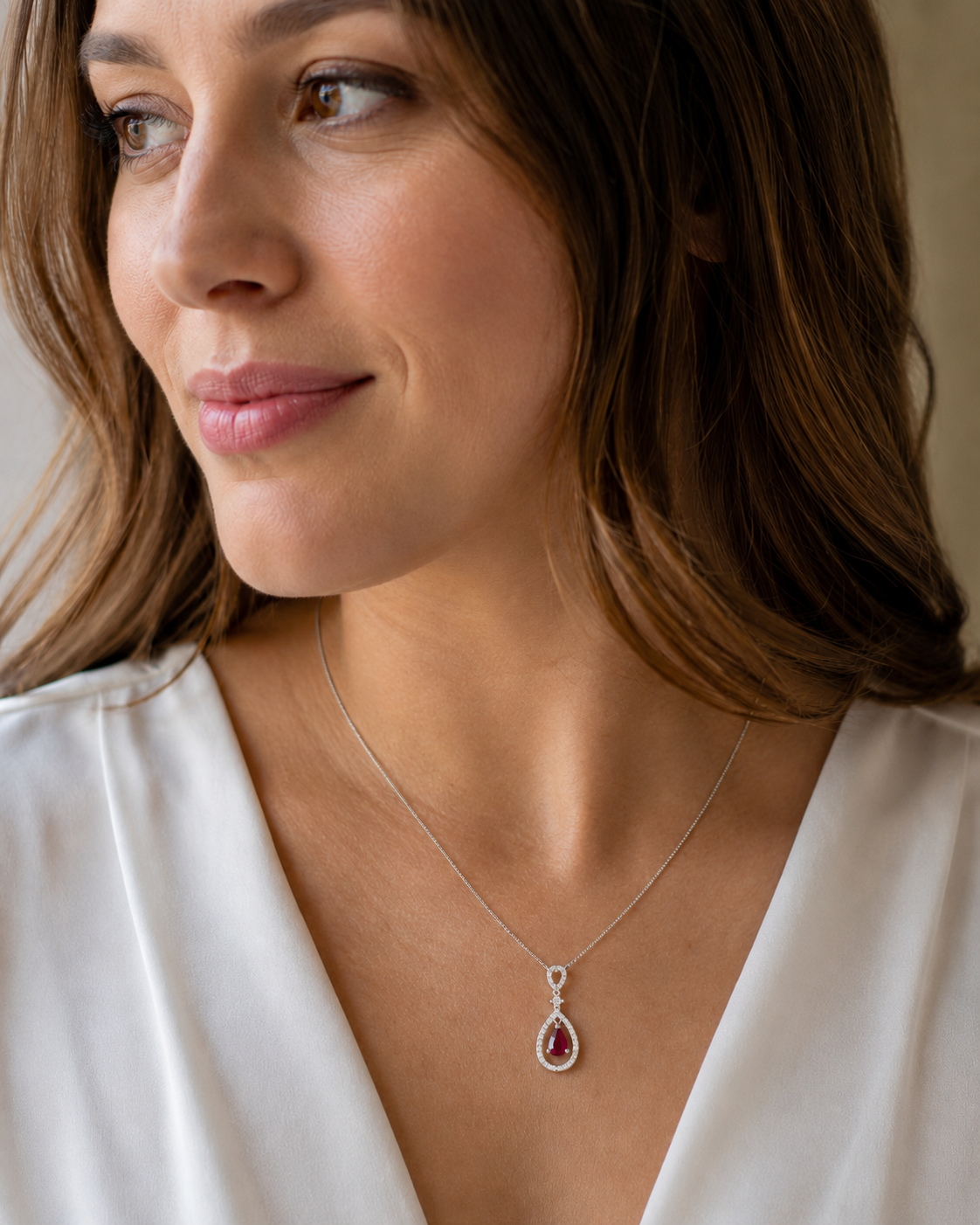 Ruby 4x6mm Pear, 0.40ct & 0.21ct Diamond Pendant in 9 Carat White Gold
