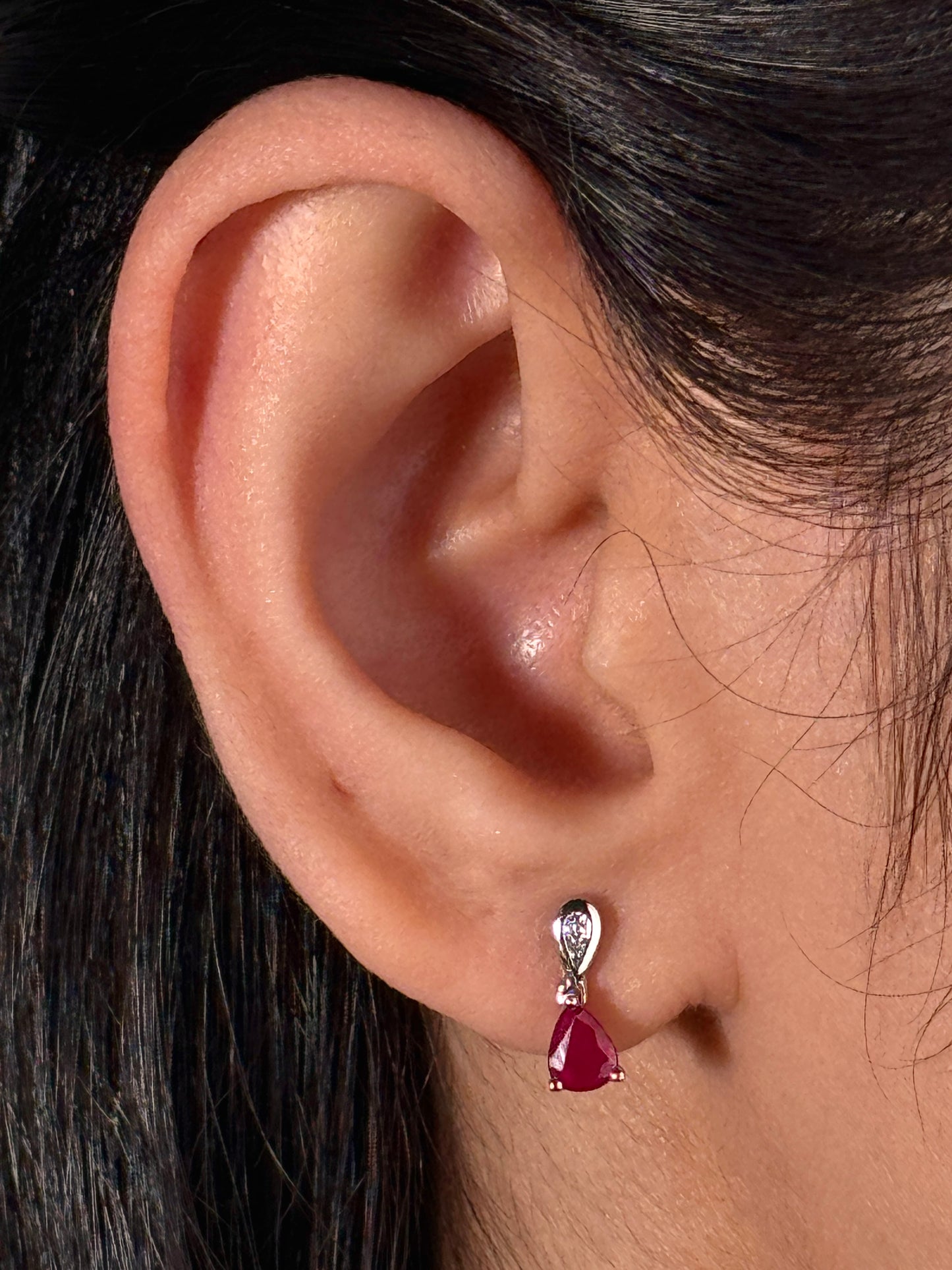 4x5mm Pear Ruby & 0.04 Carat Diamond Earrings in 9 Carat White Gold