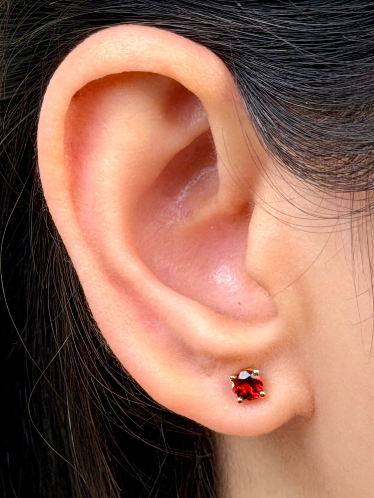 Garnet Studs in 9 Carat Yellow Gold