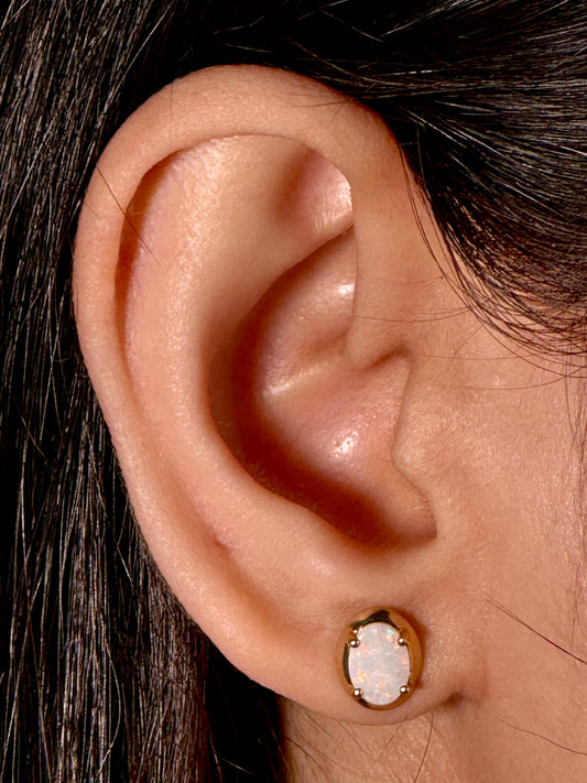 Solid Opal earrings in 9 Carat Yellow Gold