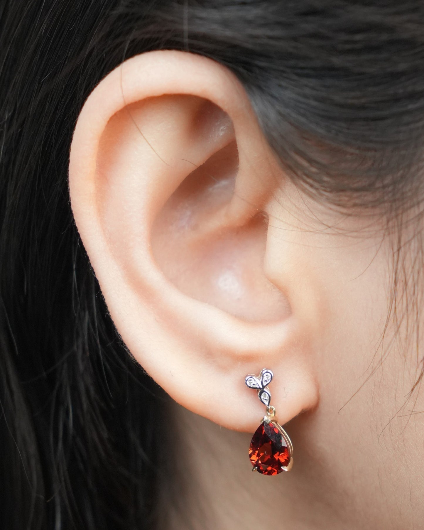 Garnet & Diamond earrings, 9K yellow gold