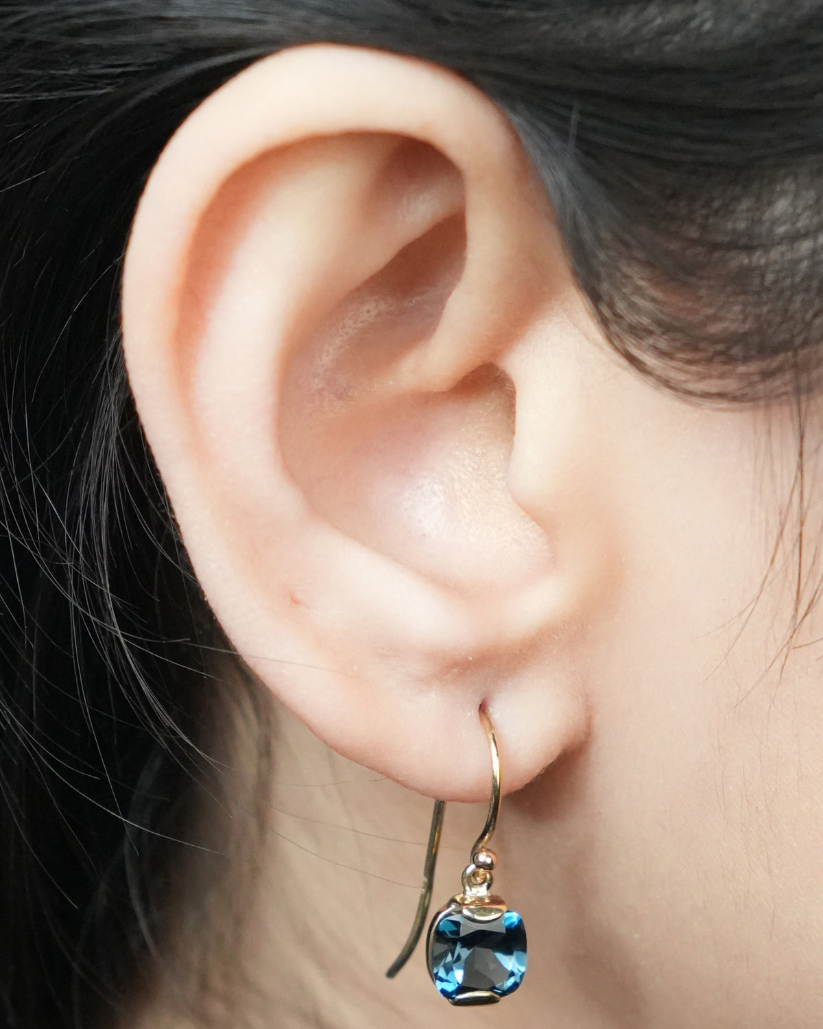 London Blue Topaz Earrings 9k yg shepherd hook drops.