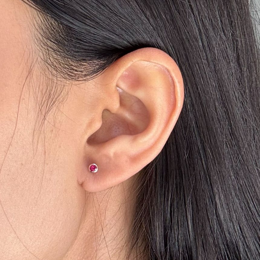 2.6mm Round Ruby Stud Earrings in 9 Carat Yellow Gold
