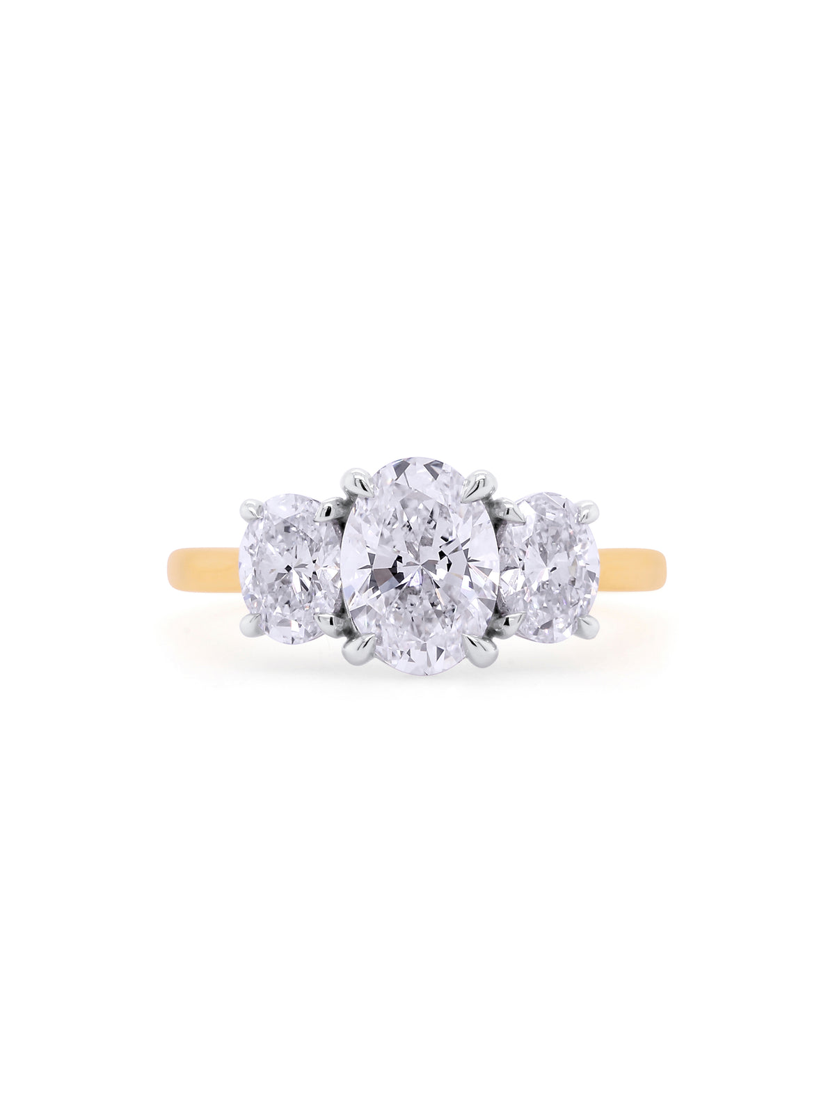 Lab Grown Oval Diamond Trilogy. 18 Carat Yellow & White Gold