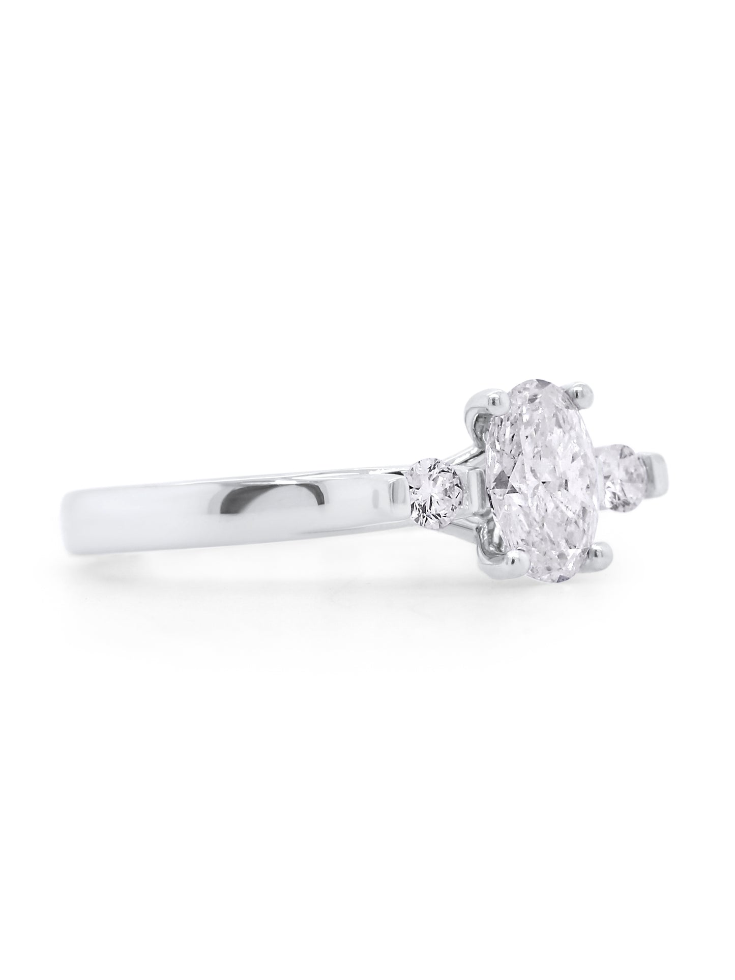 Trilogy Oval Diamond Ring, T=0.83 Carat, 18 Carat White Gold.