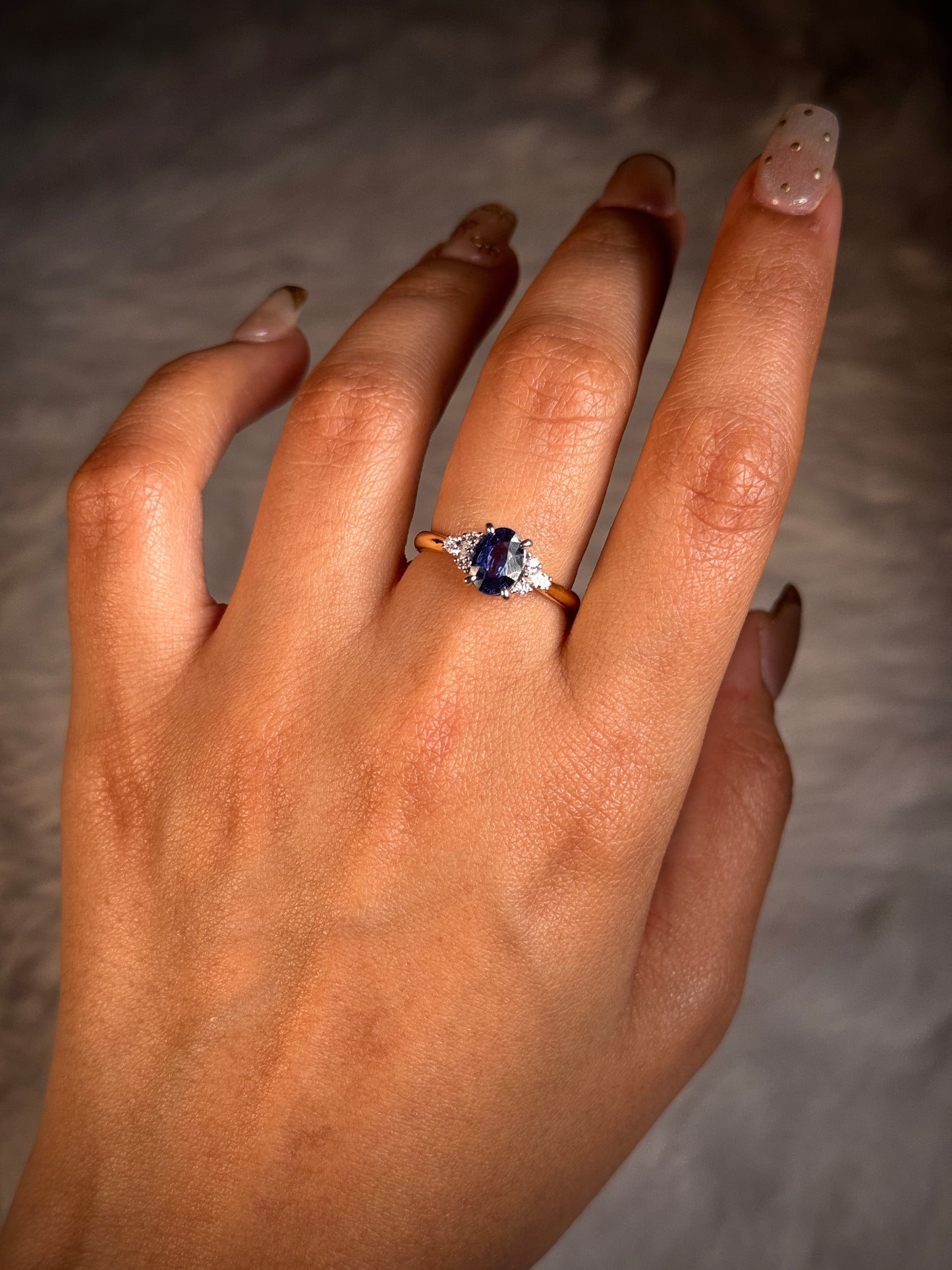 Oval Sapphire & Diamond Ring in 18 Carat Yellow Gold.