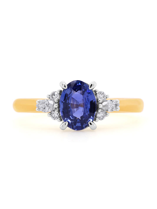 Oval Sapphire & Diamond Ring in 18 Carat Yellow Gold.