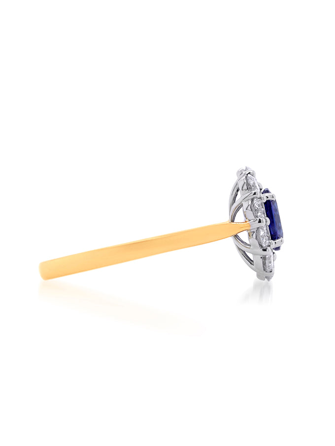 Sapphire 7x5 & 10=.70ct Diamond Cluster Ring in 18 Carat Yellow Gold