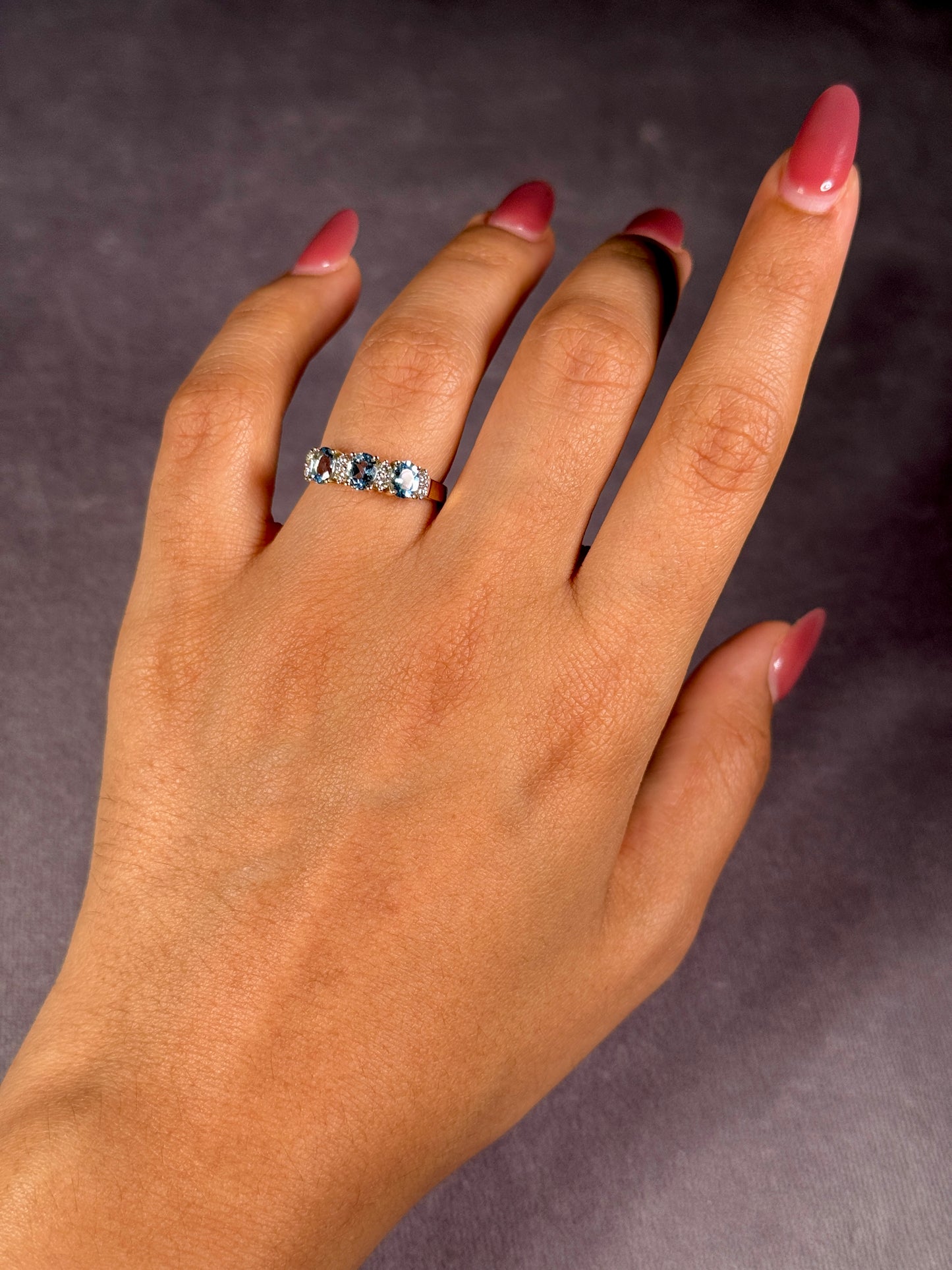 Aquamarine And Diamond Set Trilogy ring, 9k yellow gold