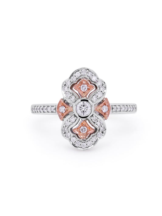 Stunning claw set pink diamonds surronded by diamond halo.