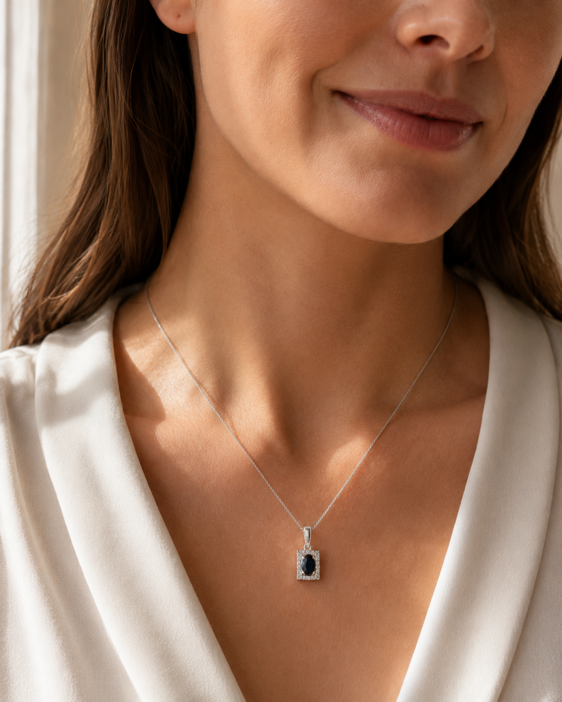 Sapphire 4x6mm, 0.46ct & 0.15ct Diamond Pendant in 9 Carat White Gold