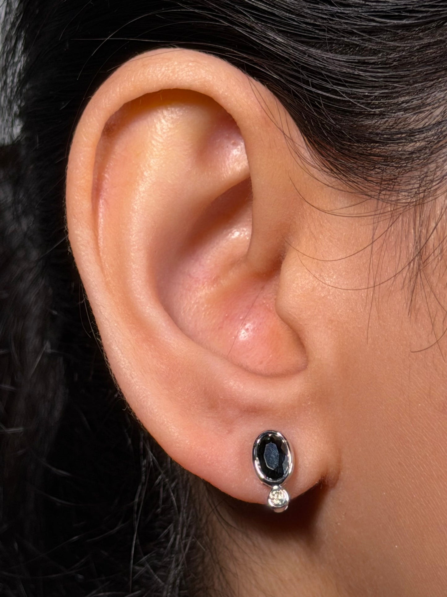4x6mm Oval Sapphire & 0.04 Carat Diamond Earrings in 9K White Gold