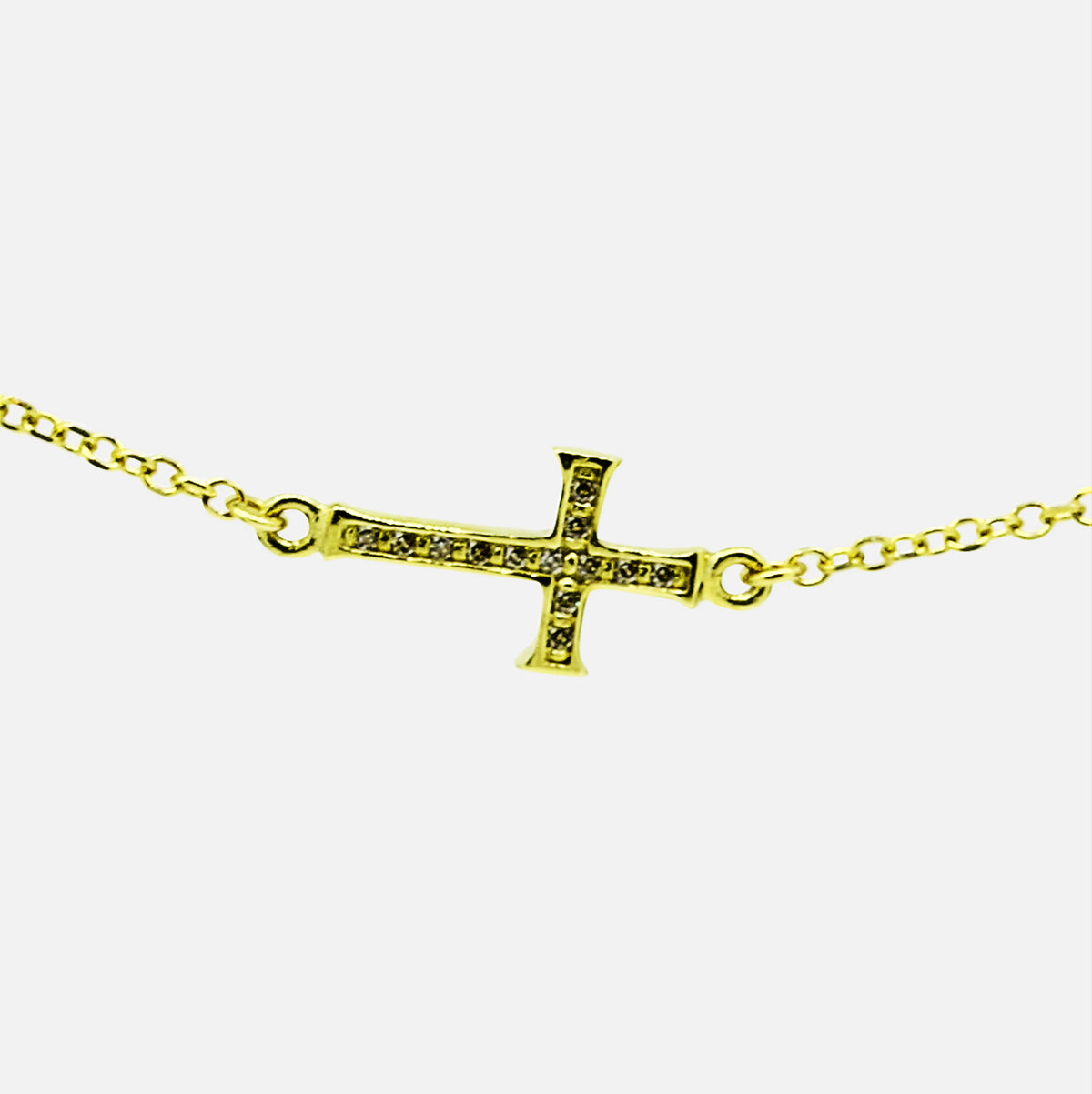 Cross bracelet cubic zirconia set 9k yg 18cm