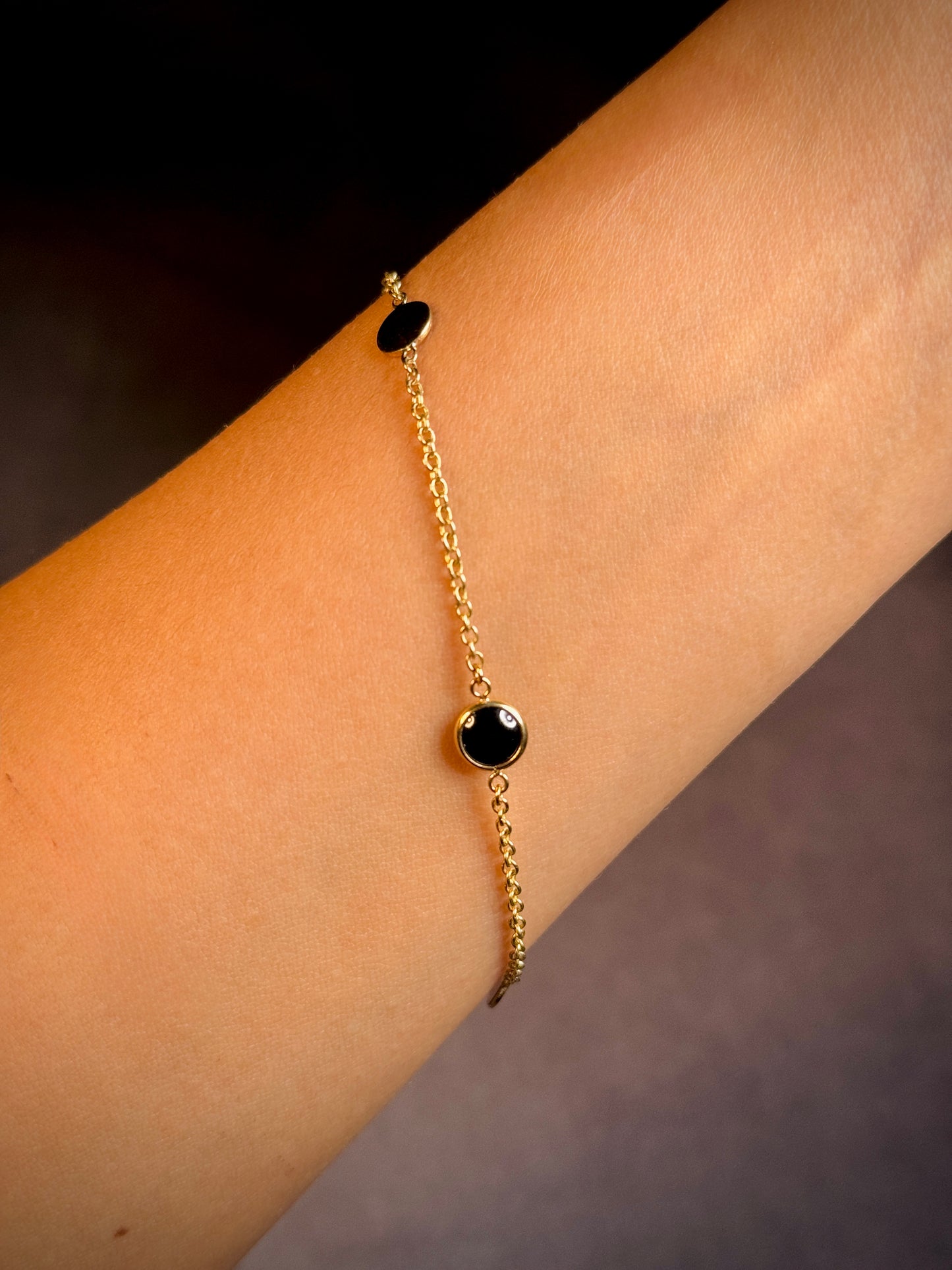 Black Onyx Disks on a 9 Carat Yellow Gold Chain Bracelet,