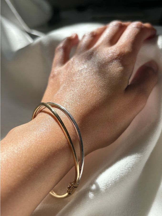 60mm Open Yellow and White Gold bangle in 9 Carat Gold