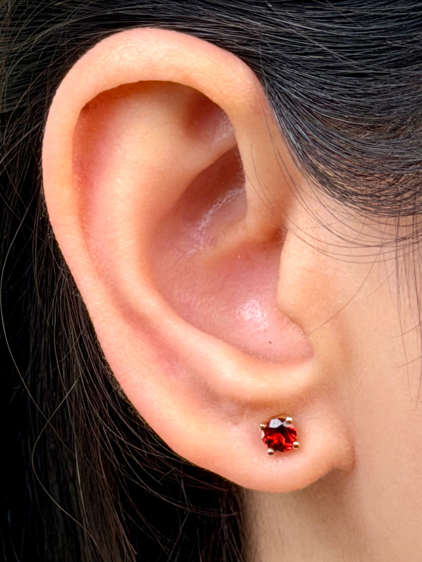 Garnet Studs in 9 Carat Yellow Gold